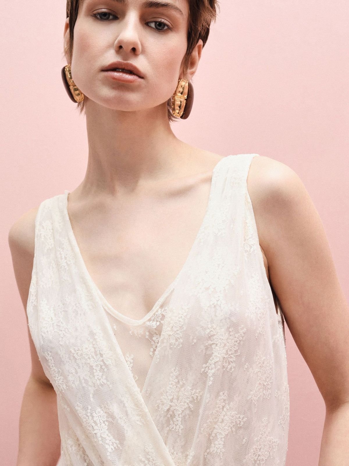 Body incrociato trasparente senza maniche stampa floreale Donna - Imperial - World Fashion