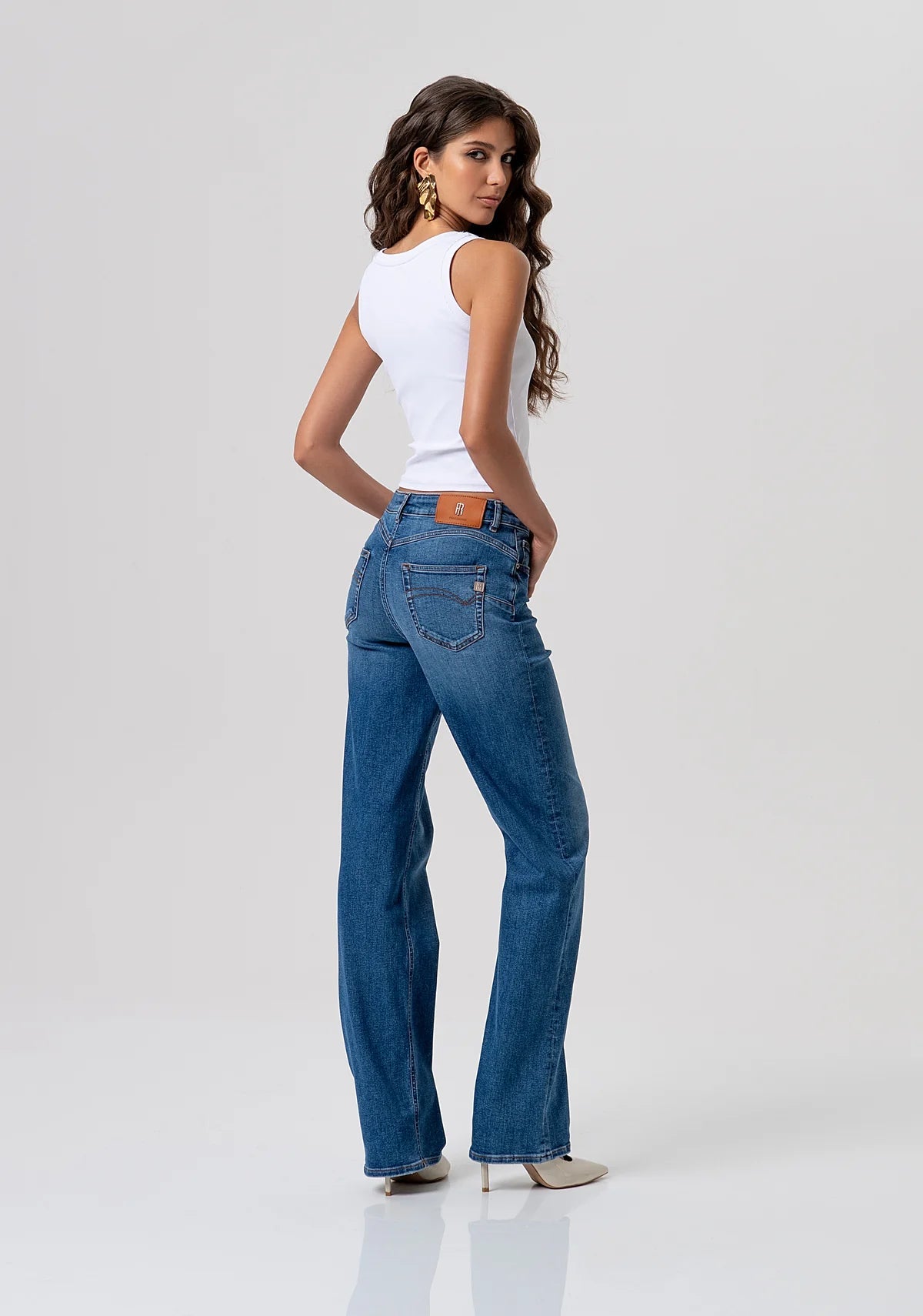 Jeans flare effetto push up in denim con lavaggio medio Donna - Fracomina - World Fashion