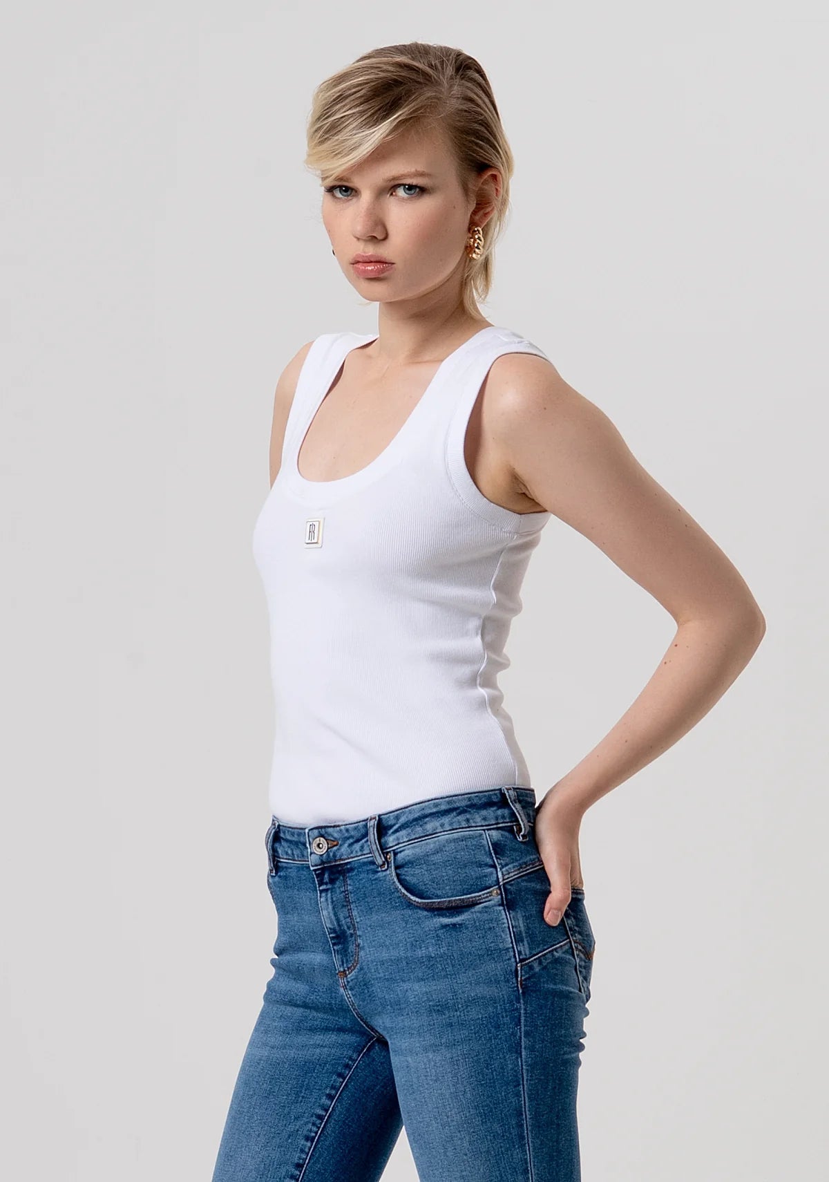 Jeans slim cropped effetto push up in denim con lavaggio medio Donna - Fracomina - World Fashion