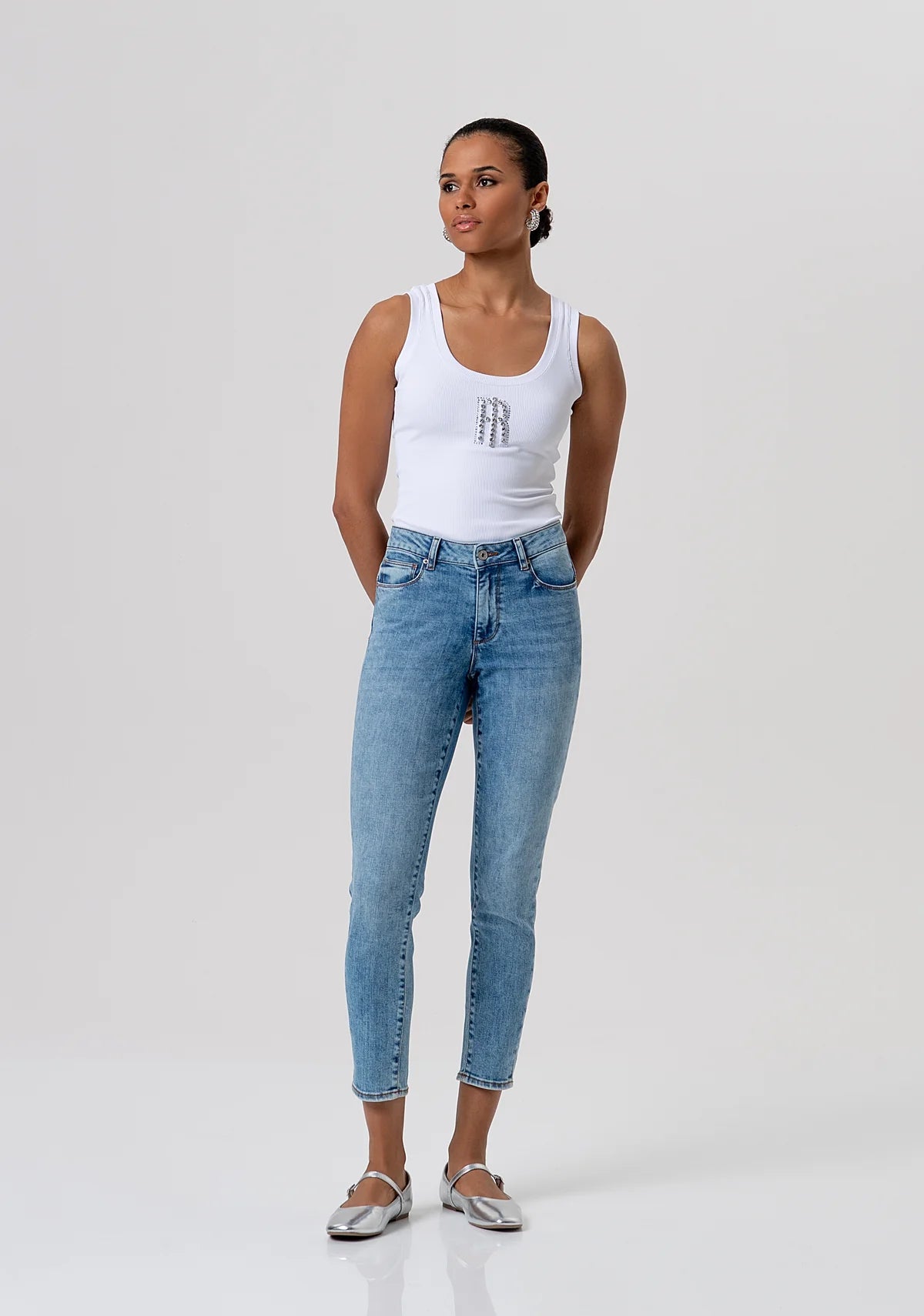 Jeans slim effetto push up in denim con lavaggio bleached Donna - Fracomina - World Fashion