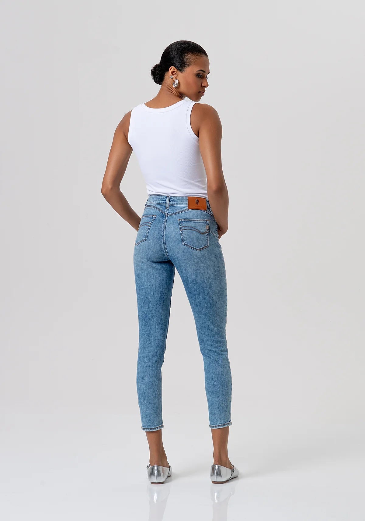 Jeans slim effetto push up in denim con lavaggio bleached Donna - Fracomina - World Fashion